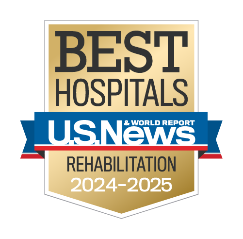 A gold badge with a blue ribbon representing Best Hospitals in Rehabilitation for 2023-2024.