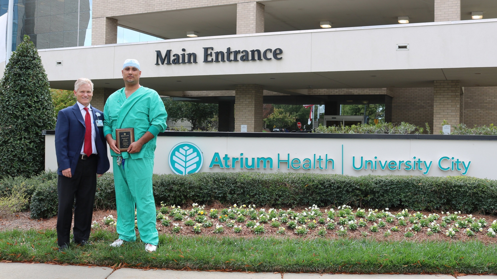 Eric Torres, a teammate at Atrium Health University City, awarded for his heroic act of assisting a man attempting suicide.